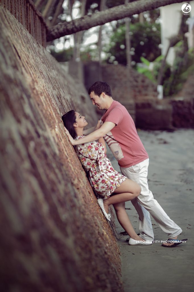 youung couple is taking photo in romantic pose @ beach of goa by jigar  darji. Photo stock - StudioNow