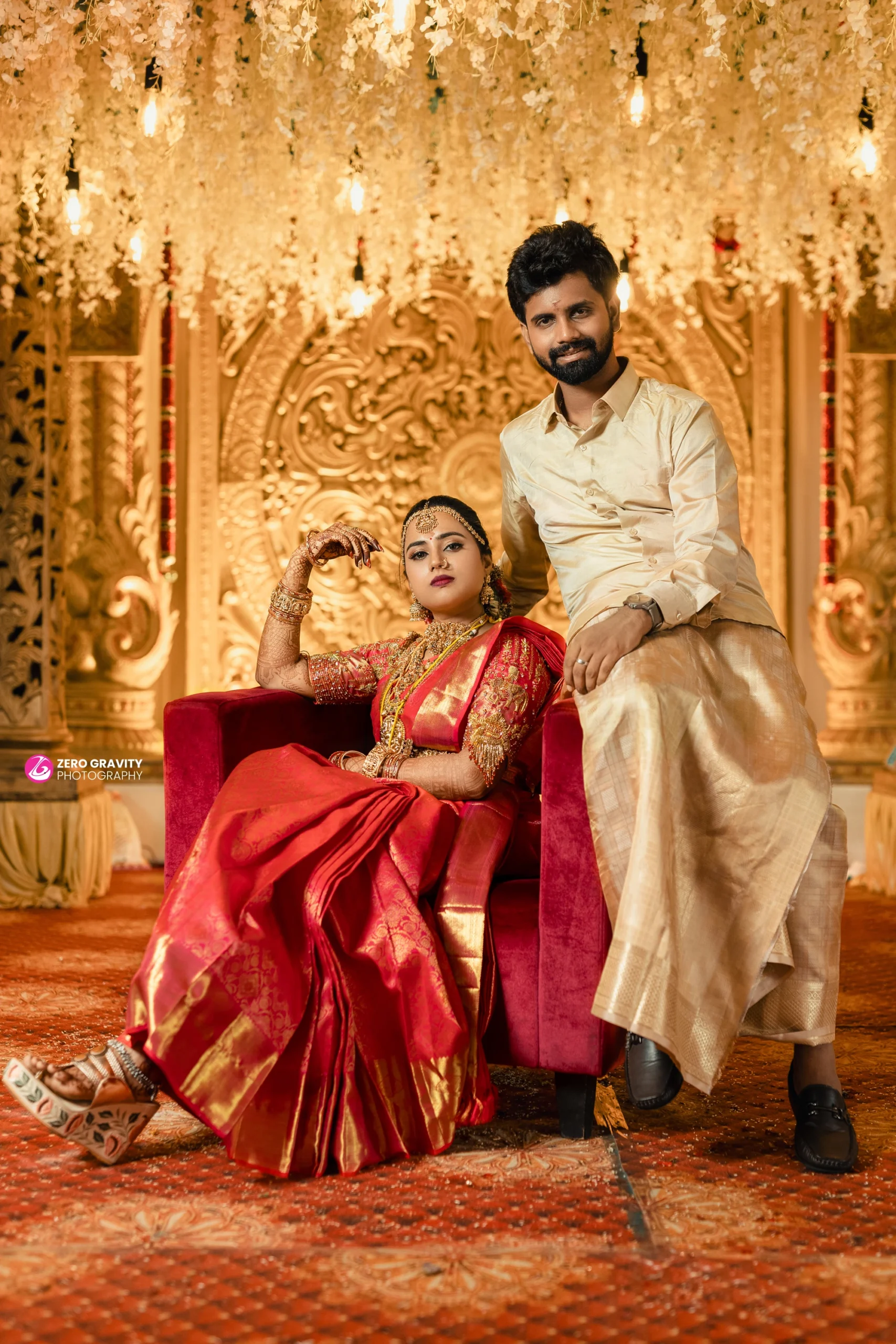 Couple seated in mandap during wedding ceremony