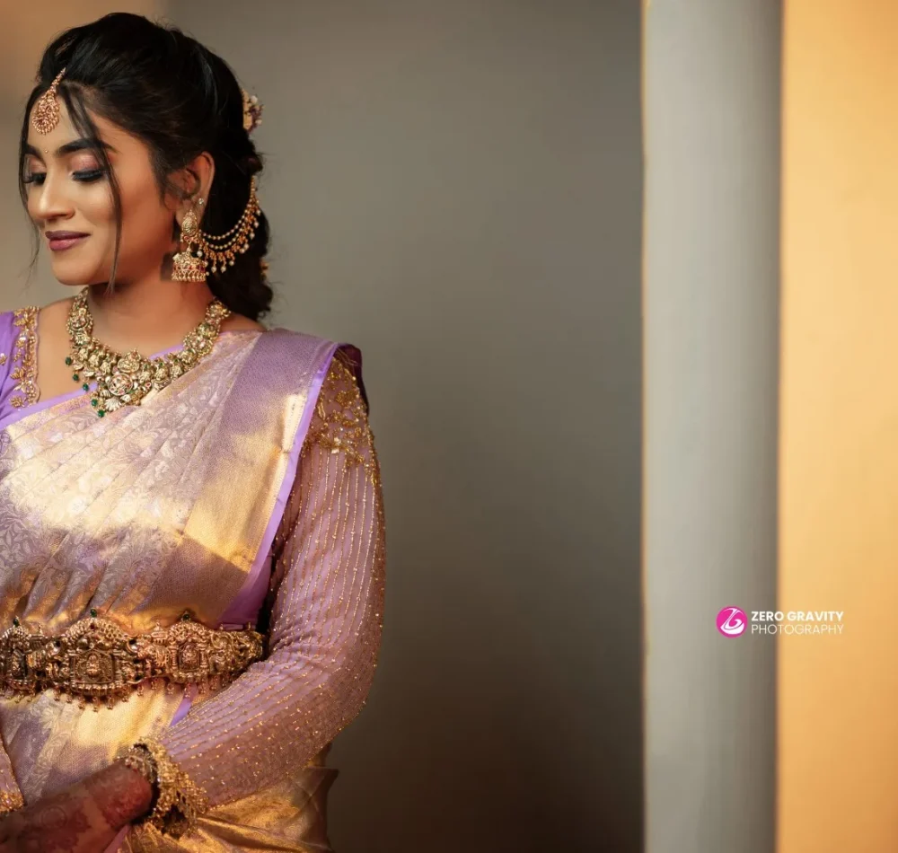 Family group photo with elders blessing the couple post-ceremony (Ashirvad)